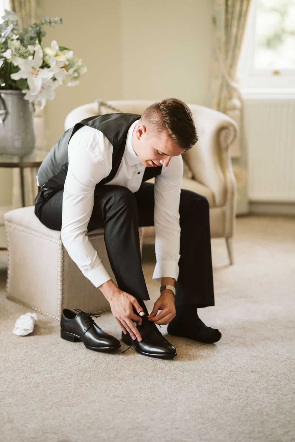 Bride getting ready on the morning of her wedding, captured by Surrey wedding photographer Will Stedman