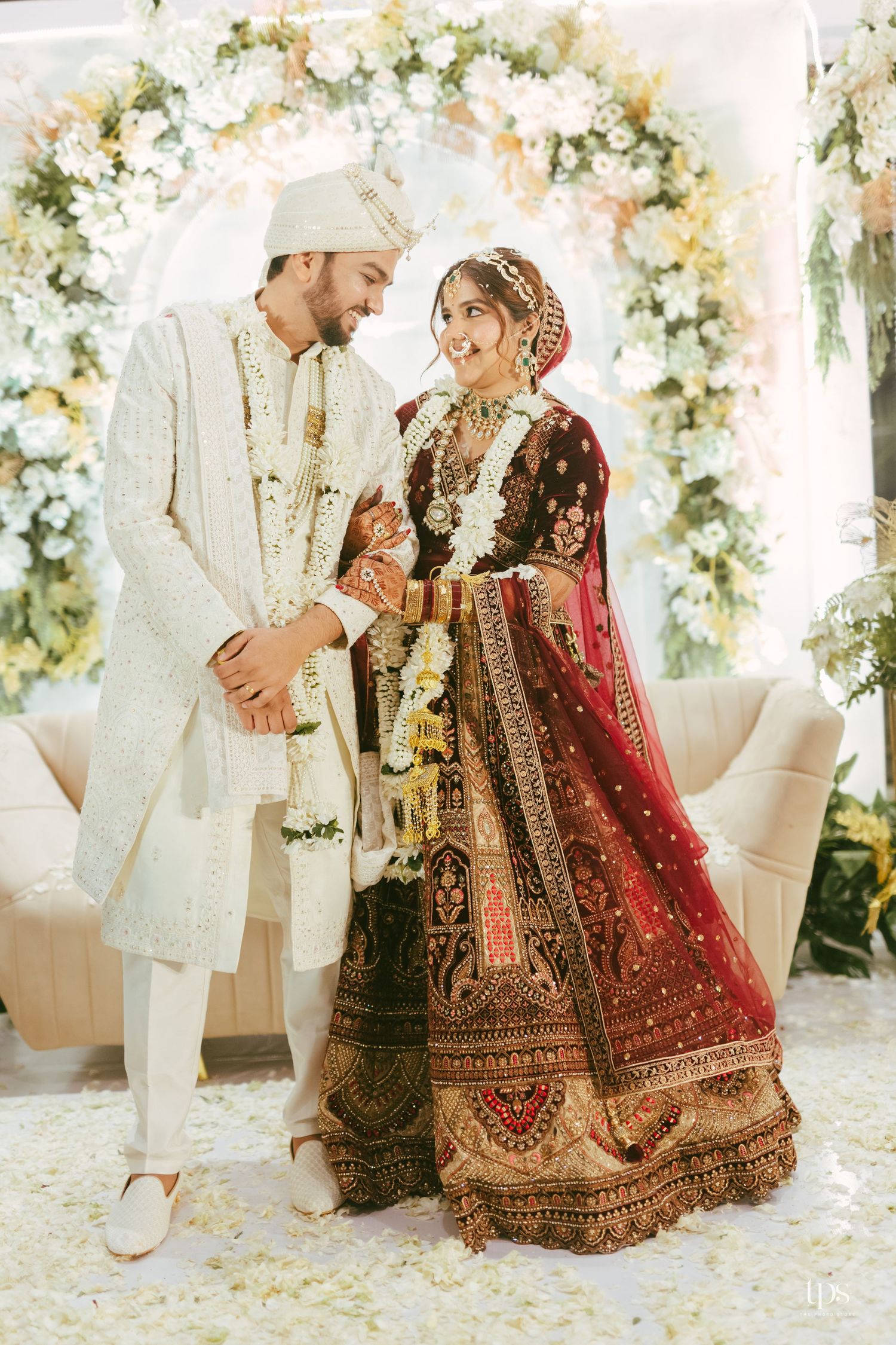 Traditional Indian wedding with elaborate florals & traditional attire, captured by a professional wedding photographer in Mumbai.