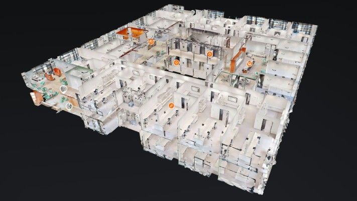 3D digital floor plan rendering of a commercial space shown from different angles.