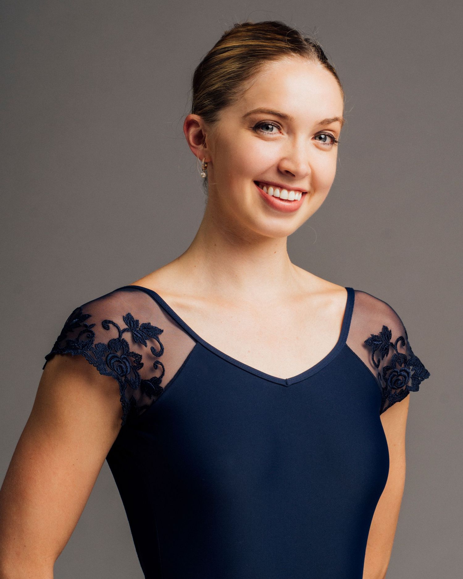 Professional Chicago dancer headshot photographer capturing clean audition portrait of a ballet dancer.