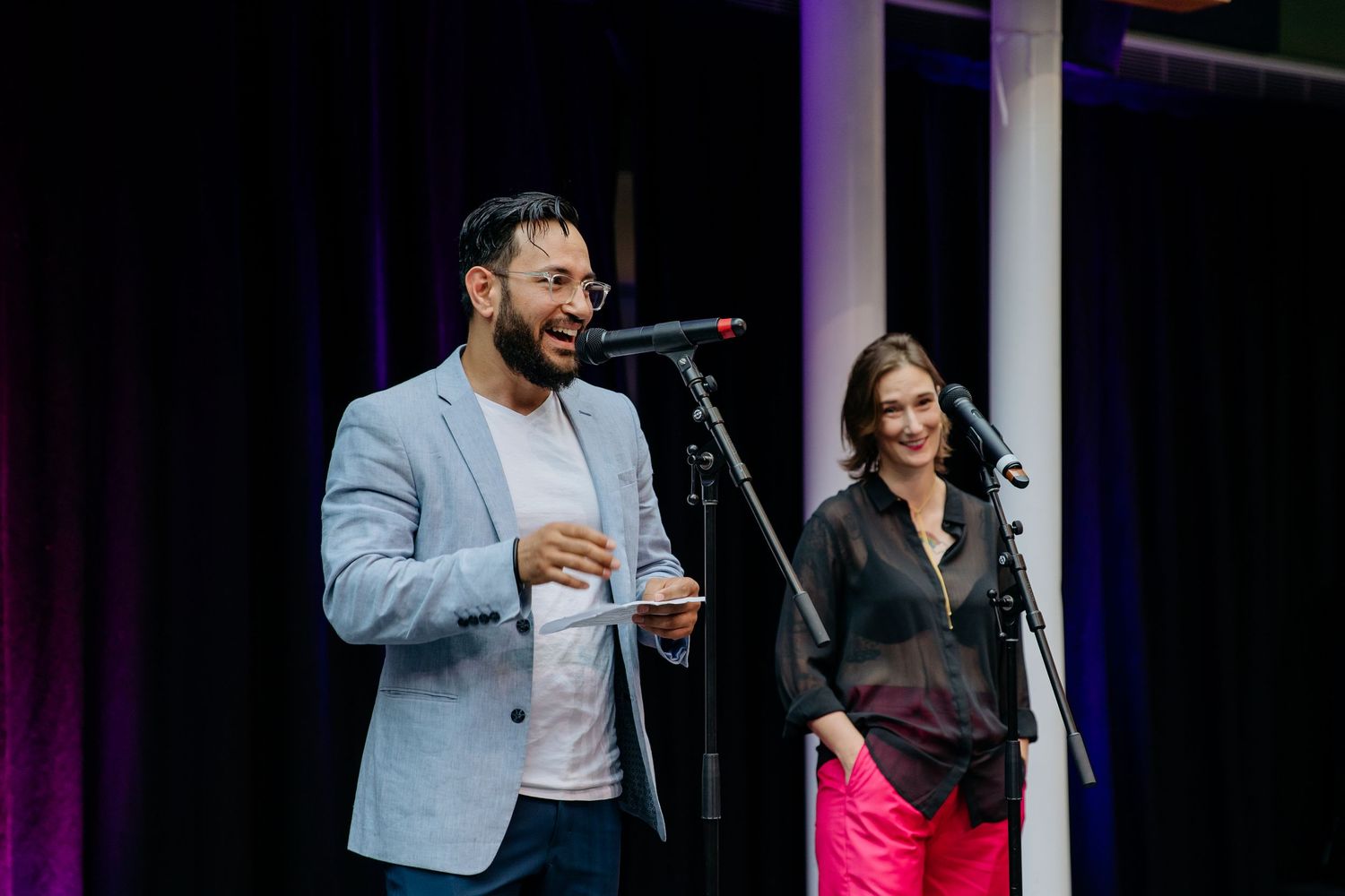 Guest speaker presenting on stage during Auckland awards night event