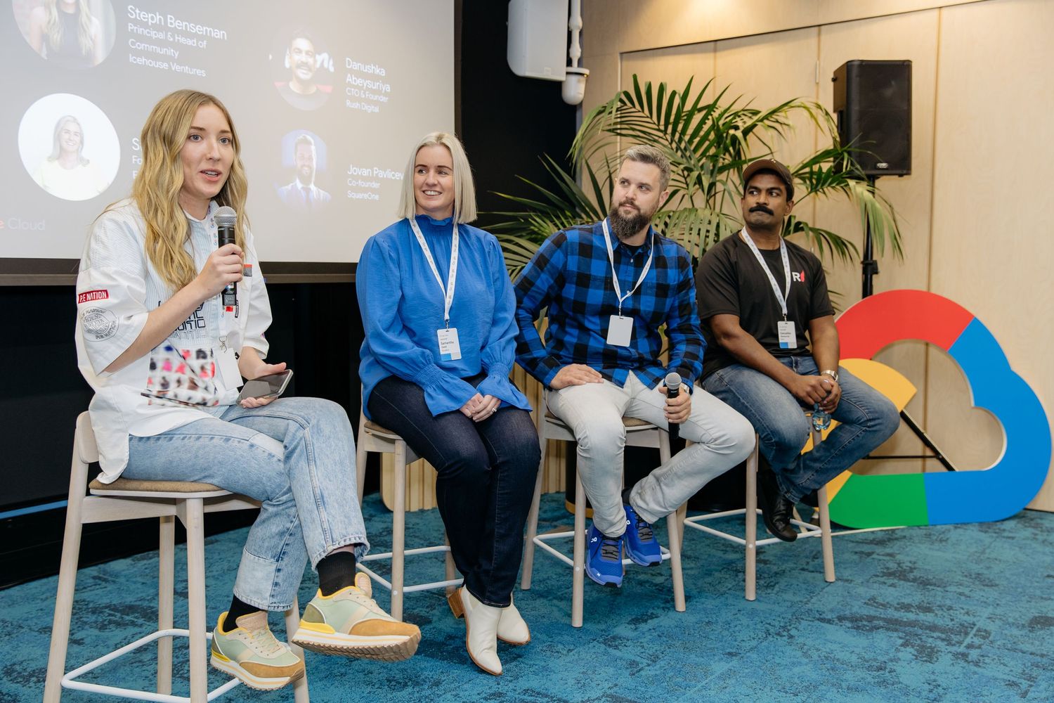 Corporate networking, presentation and panel discussion event photography in Auckland with the panel having a discussion with the audience