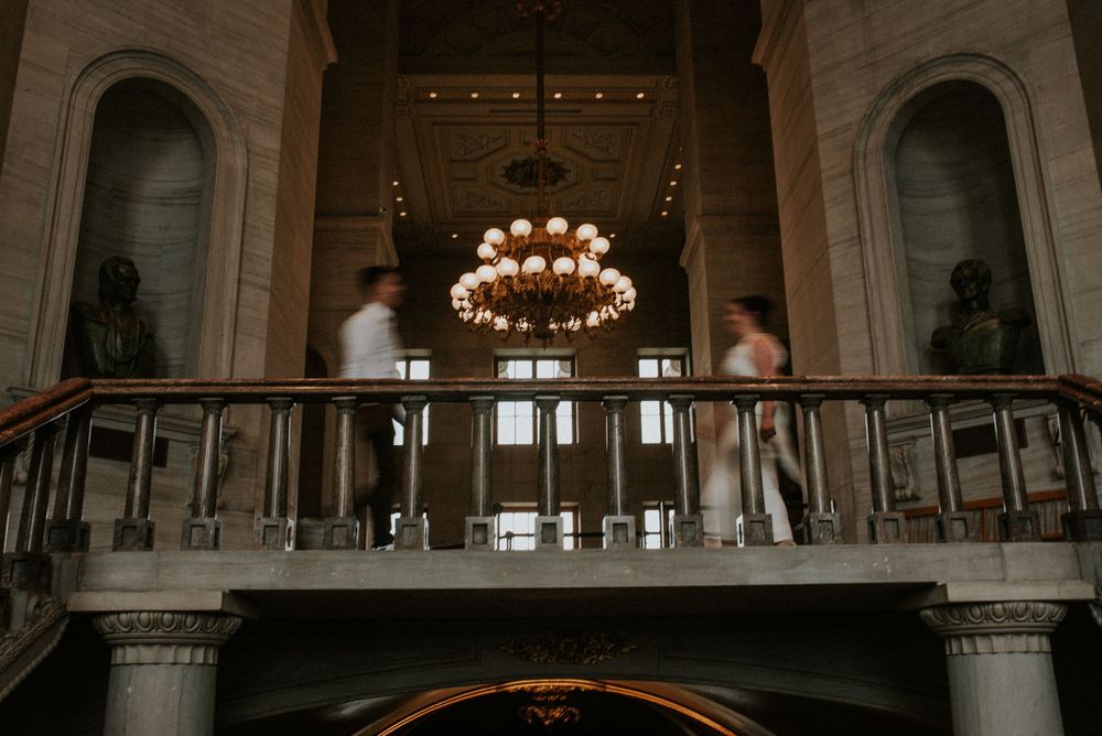 Engagement session of fast motion couple walking towards each other in Nashville, Tennessee.