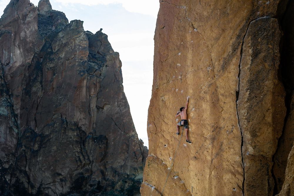American climber Jordan Cannon sport climbing in Smith Rock State Park, Oregon, USA. Climbing photography and film by Jan Virt.