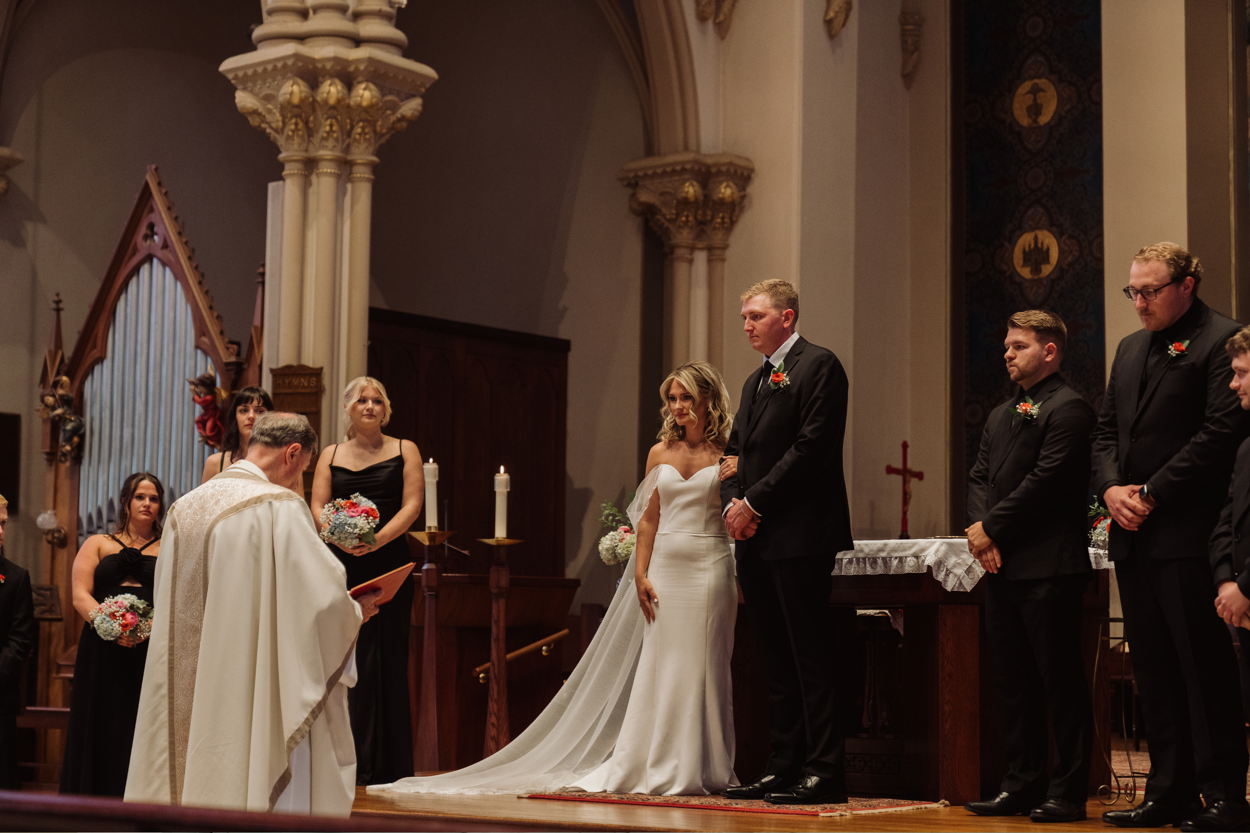 Bride and groom during church ceremony in Auburn NY