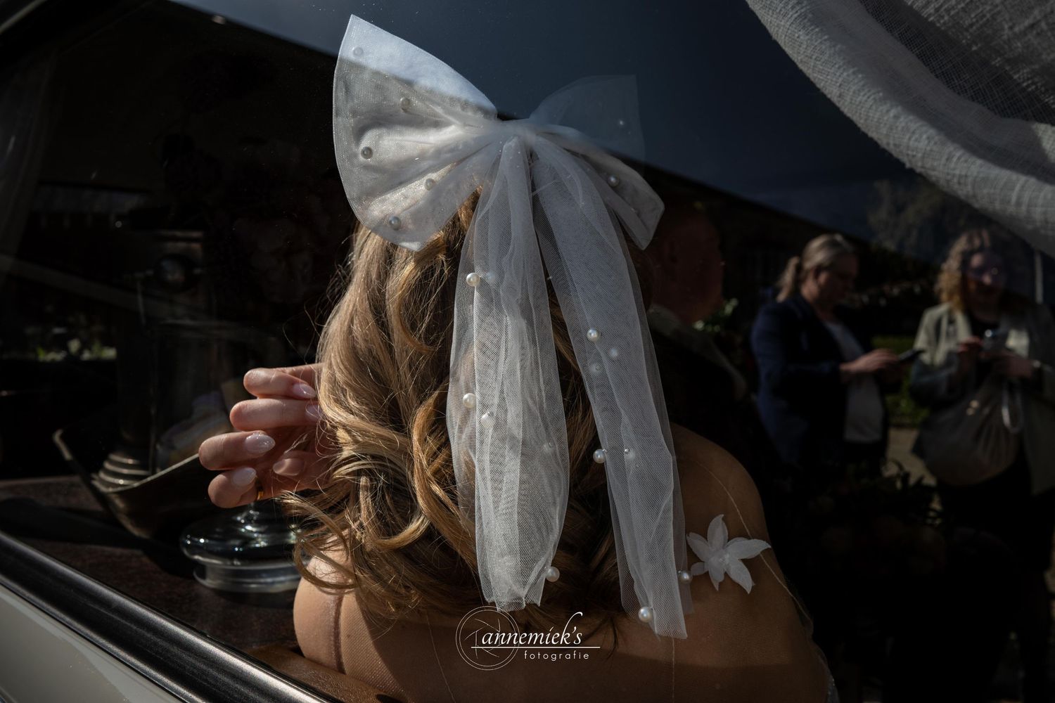 A row of wedding reception photos showing candid moments, table settings, and dancing at an evening celebration.