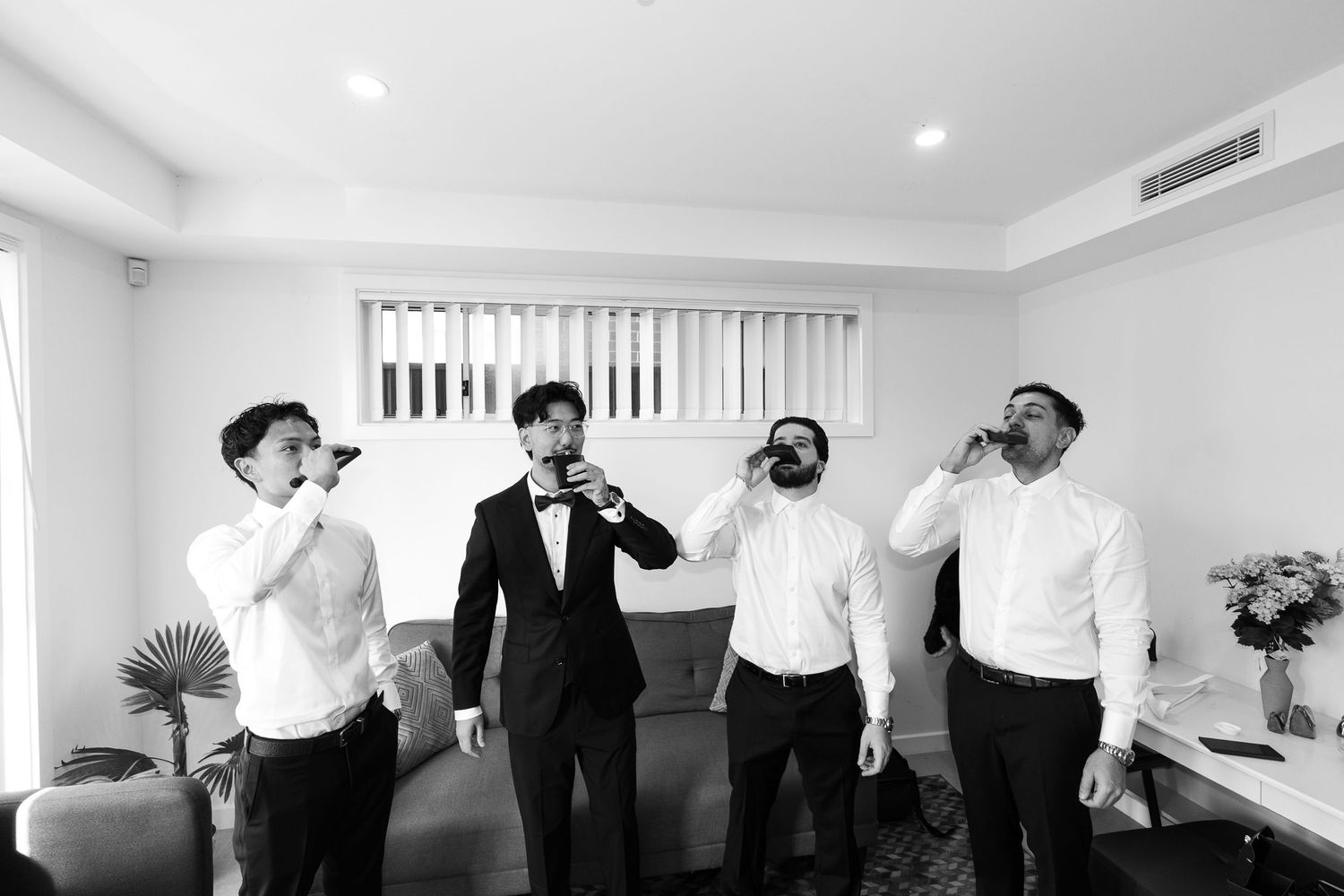 A series of black and white photos showing people in an office setting posing with dramatic expressions and gestures.