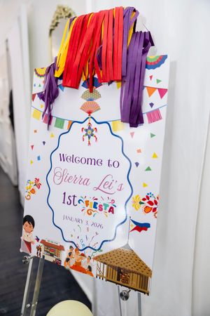 Welcome sign for Sierra Lei's 1st Fiesta birthday party on January 3, 2026 with Filipino cultural decorations.