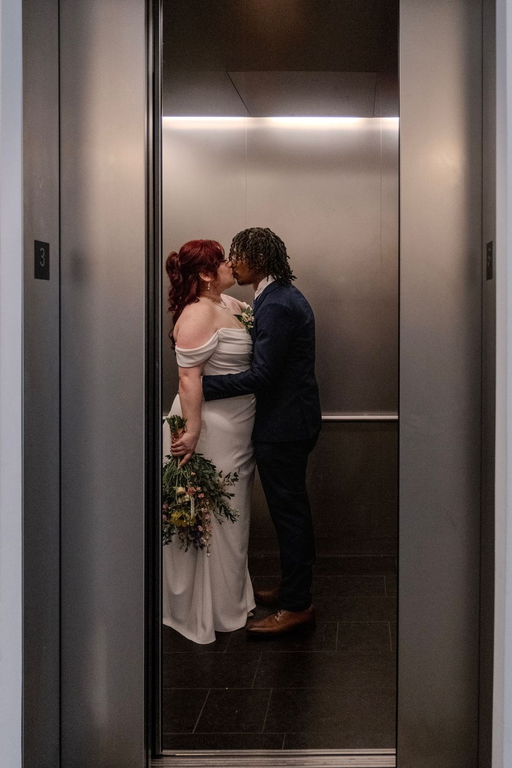 Progressive sequence of a couple sharing an intimate moment in an elevator.