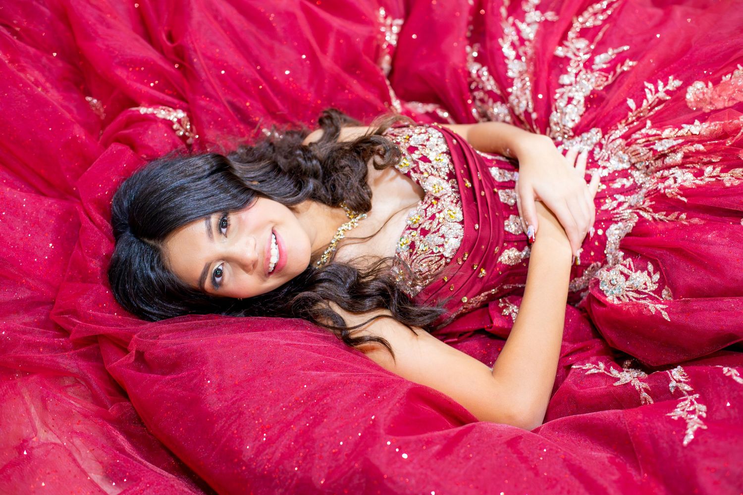 Quinceañera portrait photography showcasing confident poses, glamorous styling, and memorable milestone celebration images