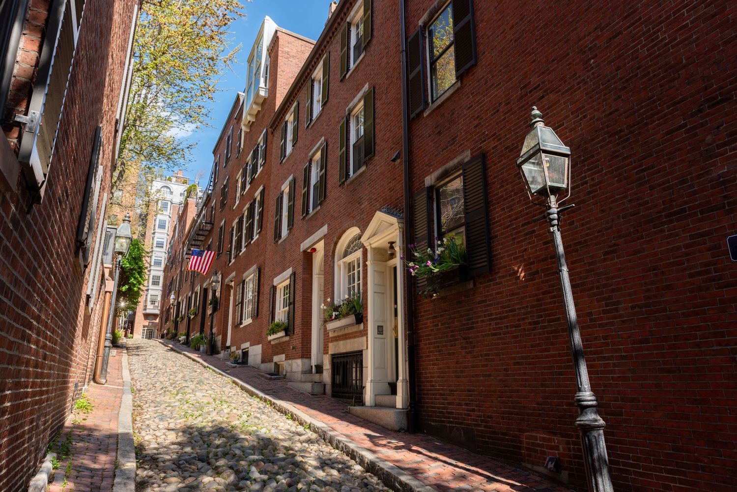 Scenic Acorn Street in Boston’s Historic Beacon Hill, photographed by Leah Ramuglia Photography.