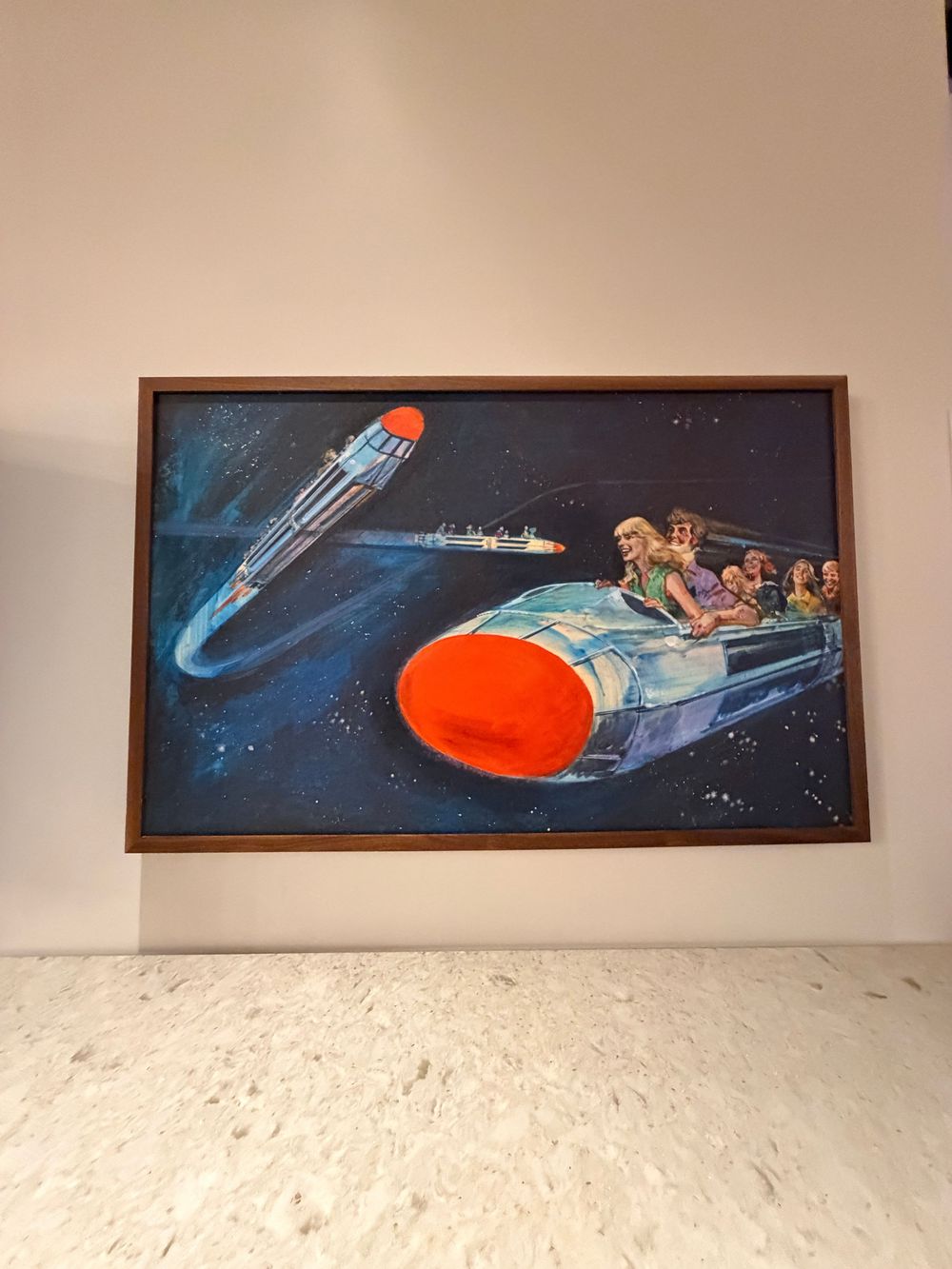 A panoramic series showing a long horizontal space painting featuring a spaceship with orange and blue cosmic elements.