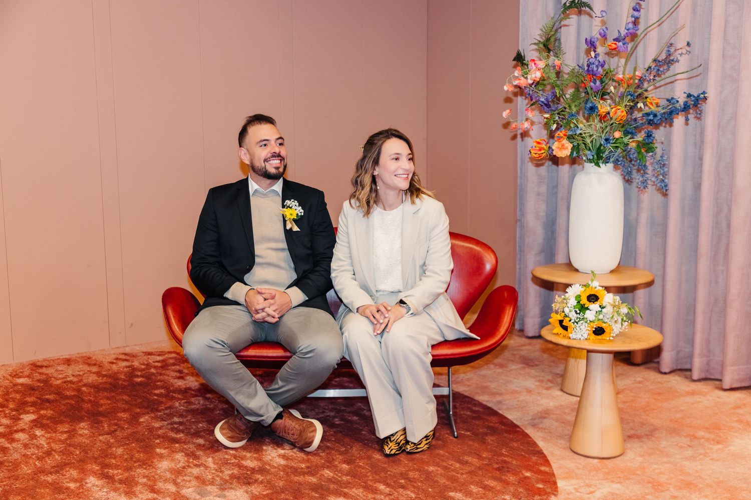 Smiling bridal couple during wedding ceremony in  Gemeente Amsterdam Oost
