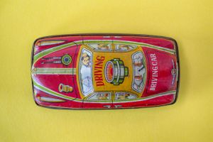 tin toy police car artwork made in response to covid-19