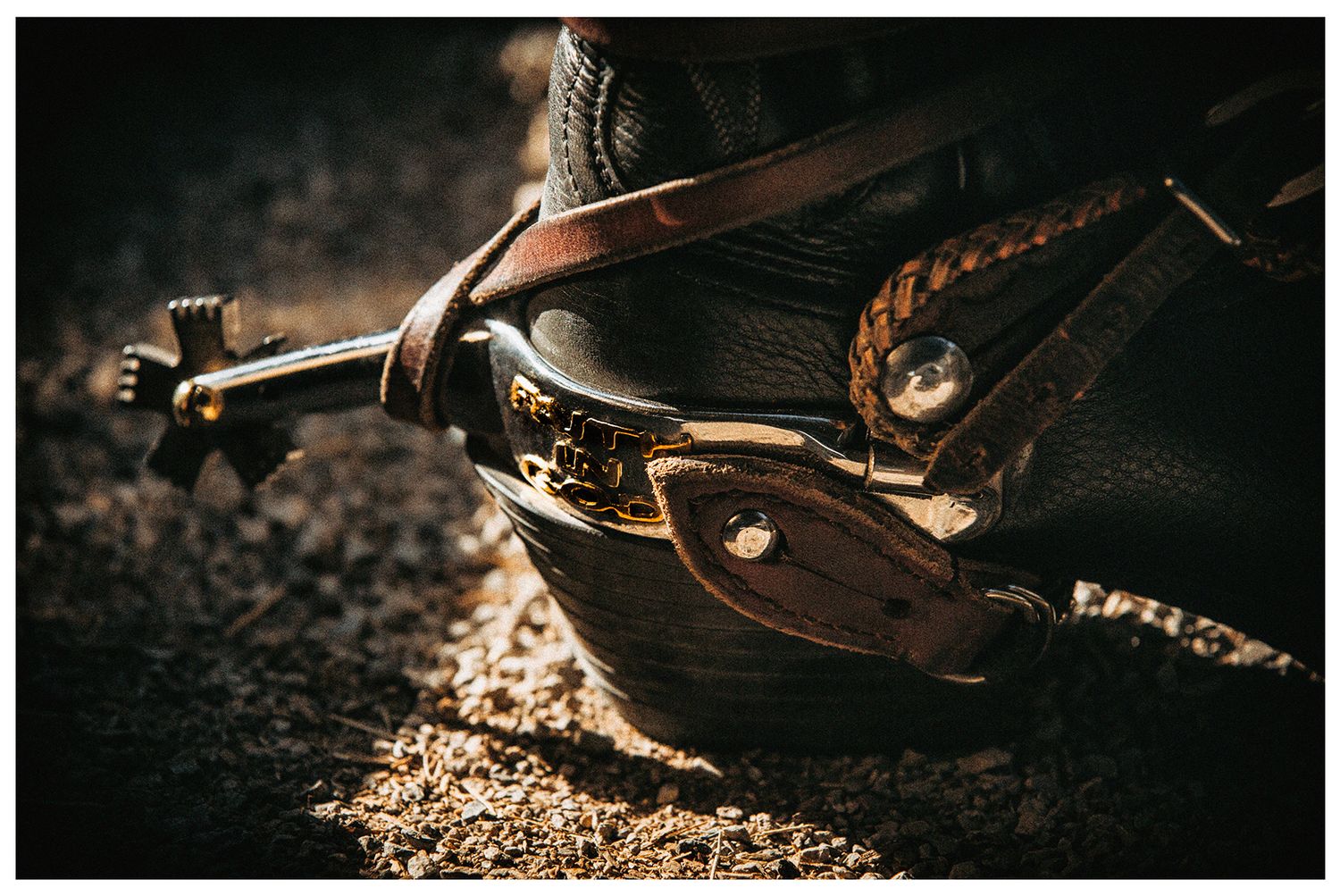 A cowboy boot with bull riding spurs for PBR Team the AZ Ridge Riders photographed by Chris Douglas