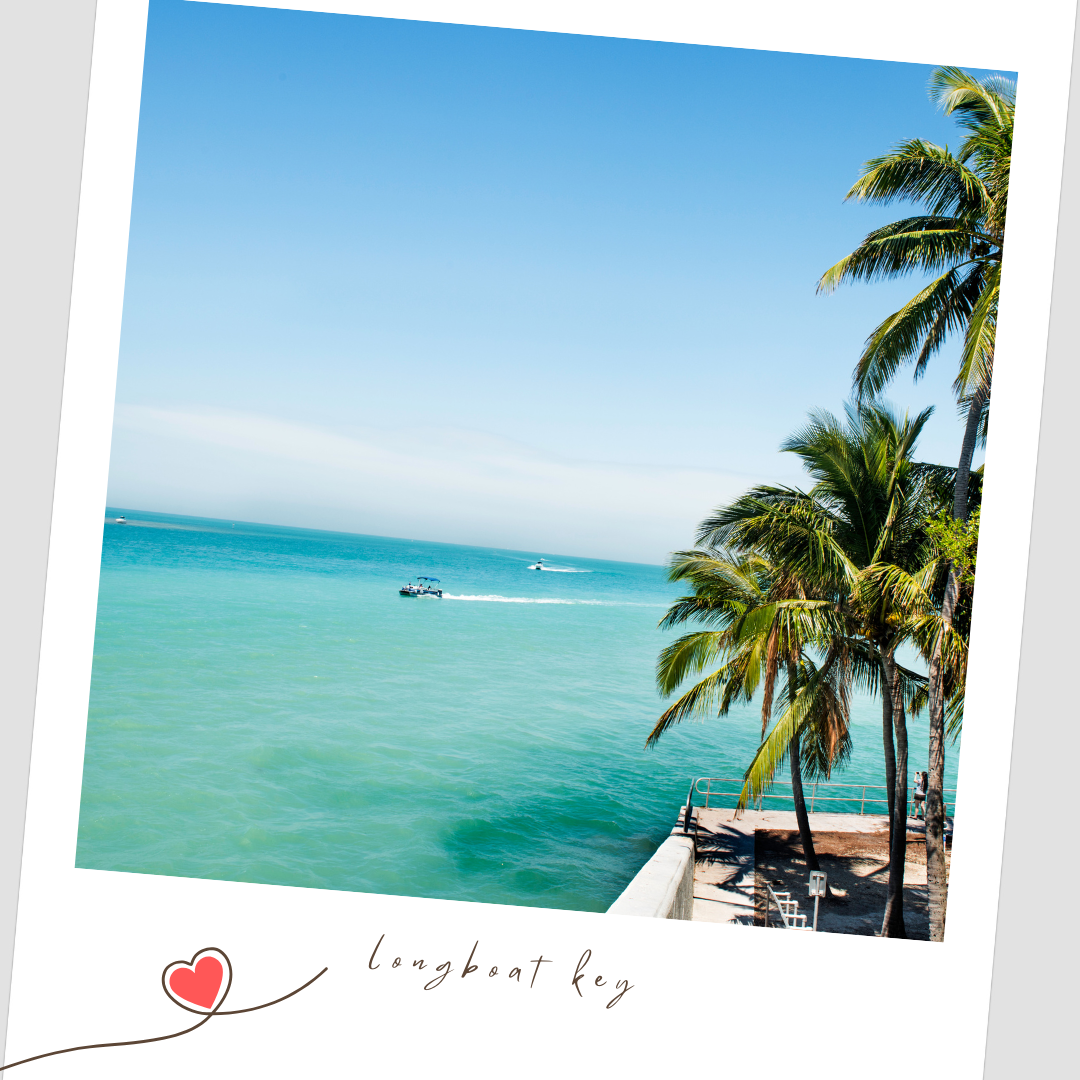 Tropical beach scene with turquoise ocean waters, swaying palm trees, and boats dotting the calm horizon. Longboat Key Florida