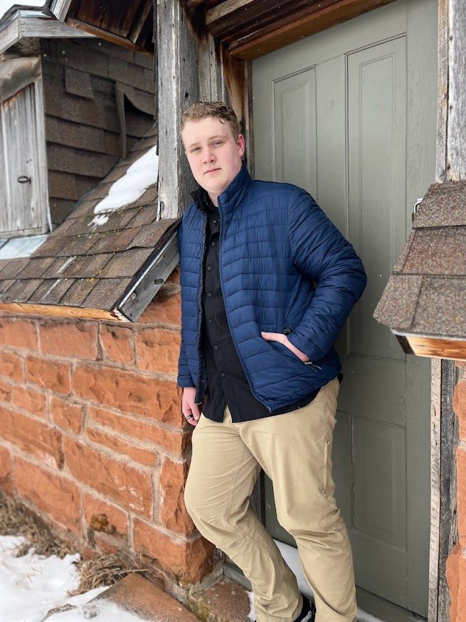 man standing in doorway