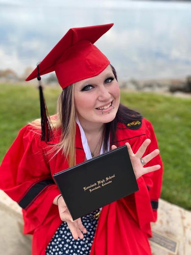 girl holding diploma