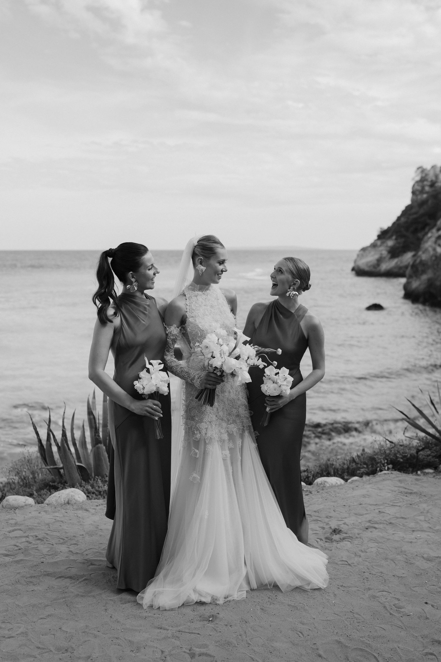 bride and bridesmaids talking and smiling at amante ibiza