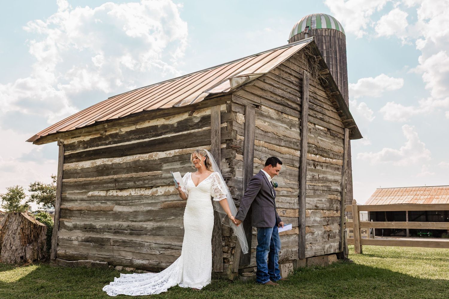 a bride and groom exchanging private, handwritten vows during their first touch before their wedding ceremony