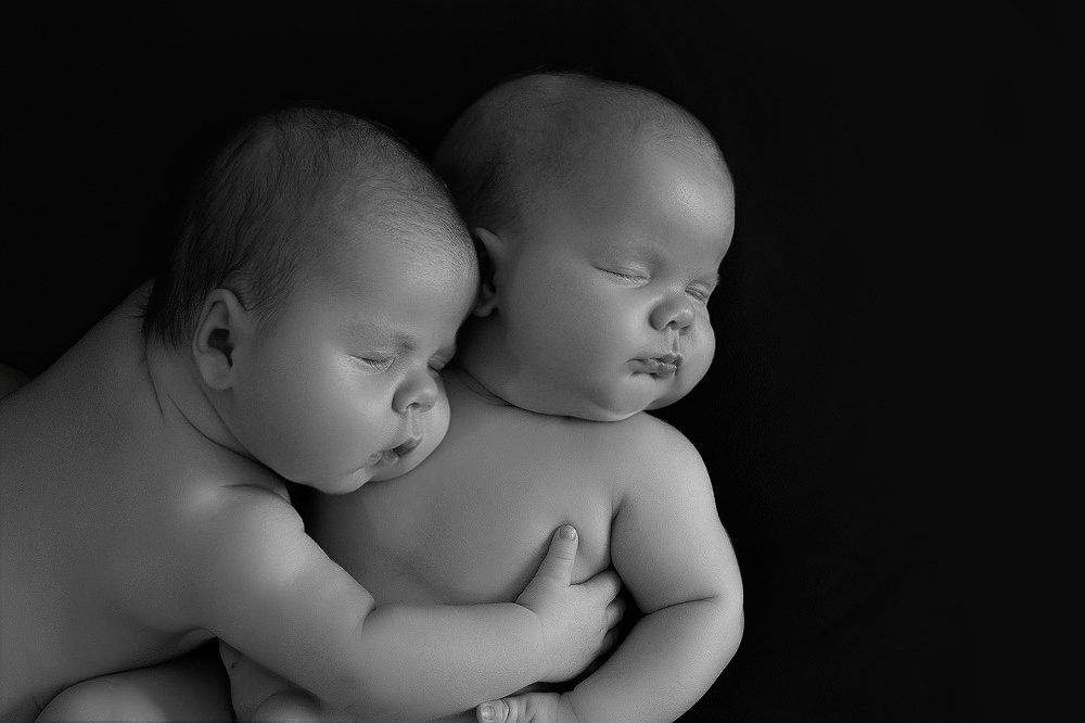 black and white photo of twin boys