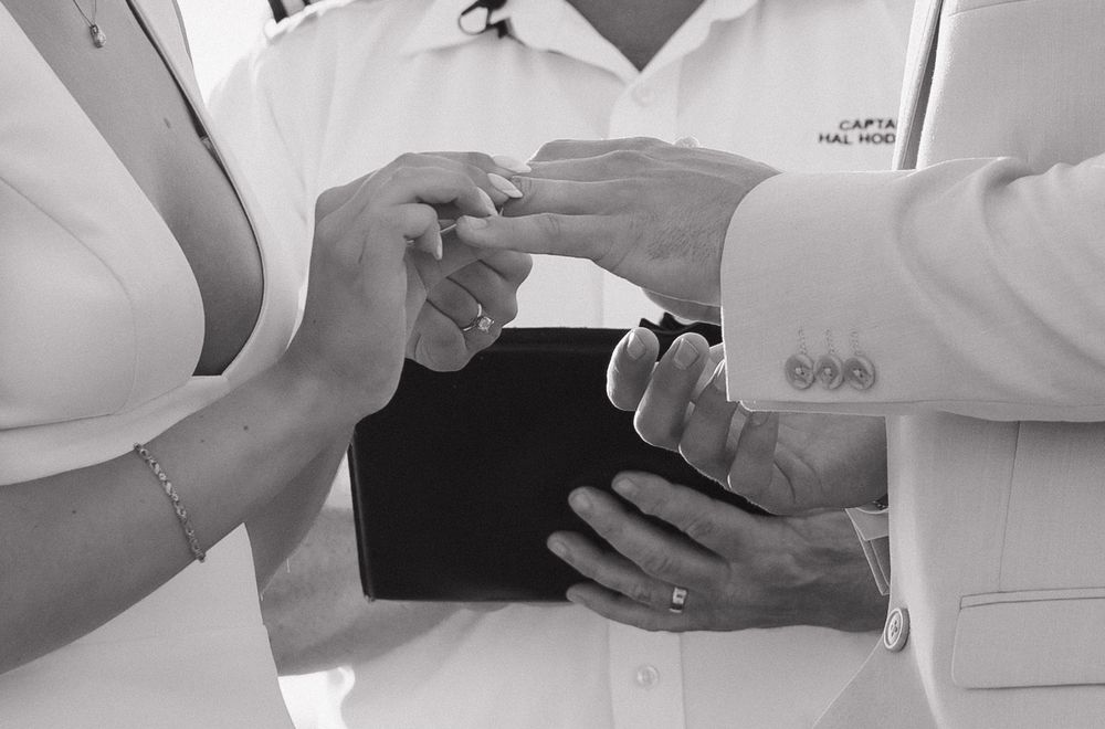 Medical professional in white coat demonstrates proper hand washing technique in sequential steps.