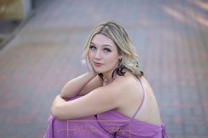 Rose Garden Julia Davis Park Boise Idaho Senior photo closeup of beautiful girl with serious expression