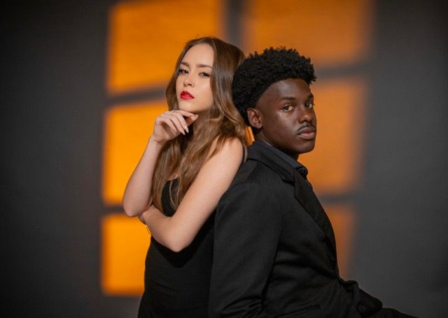 Creative couples portrait with dramatic studio lighting in Fayetteville, NC