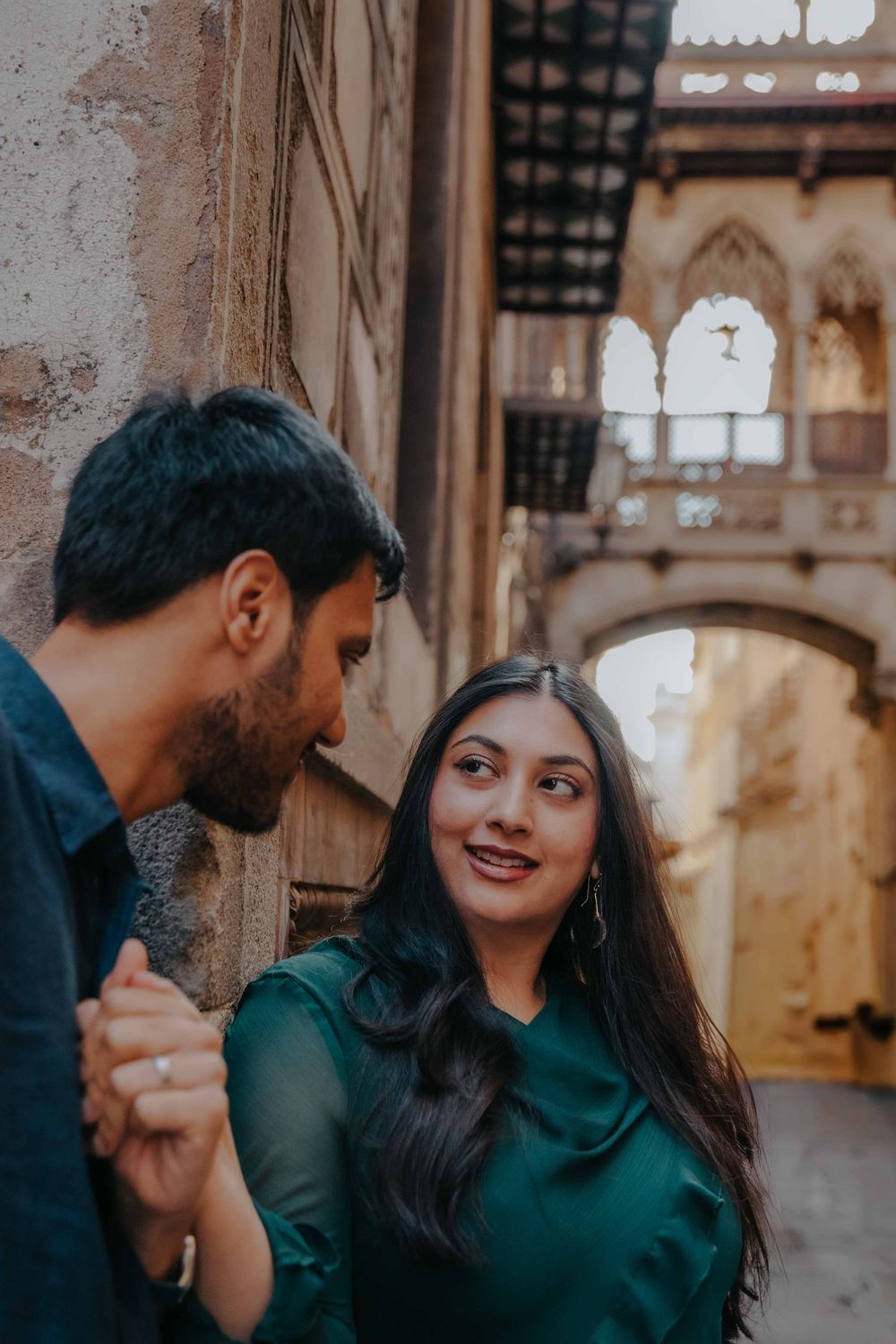 Sara looking at Owais with deep love and happiness on their anniversary.