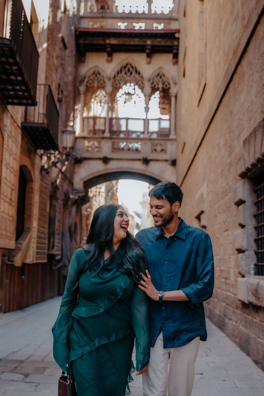 Candid Barcelona photographer capturing natural laughter and joy.
