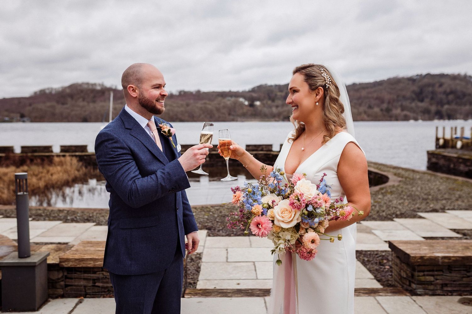 Couple portrait at Storrs Hall by Lake Windermere from the boathouse
