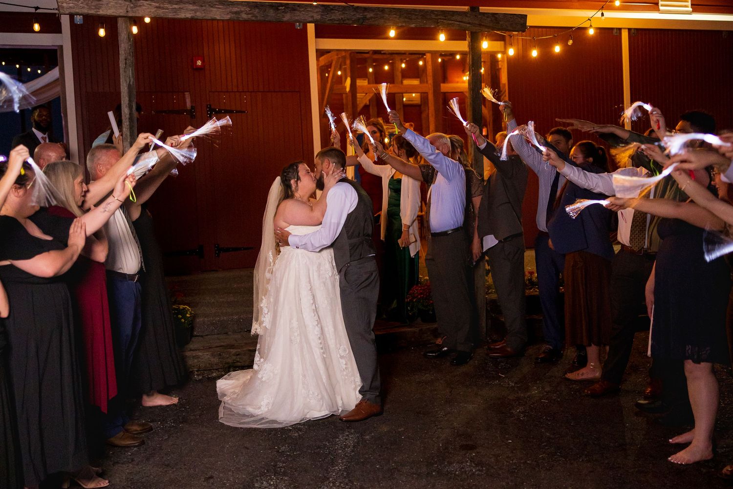 frederick maryland wedding photographer Guests form a celebratory tunnel as newlyweds make their reception exit.