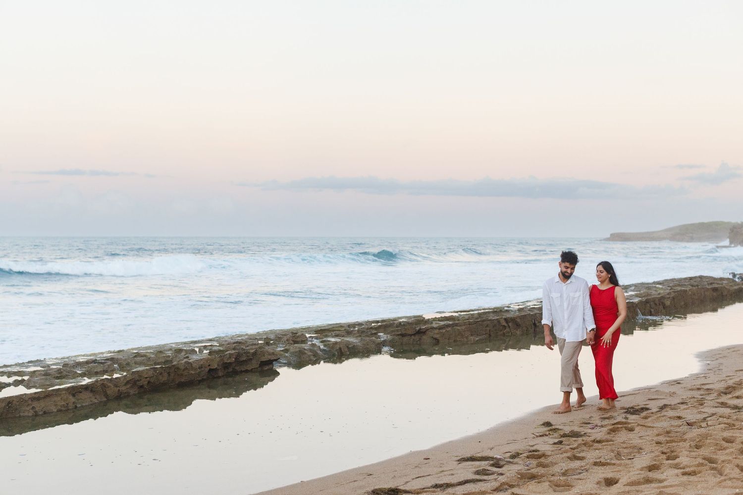 Couples portrait. Proposal and engagement session. Man and woman on the beach. Kikita Surf Beach, Dorado, Puerto Rico.