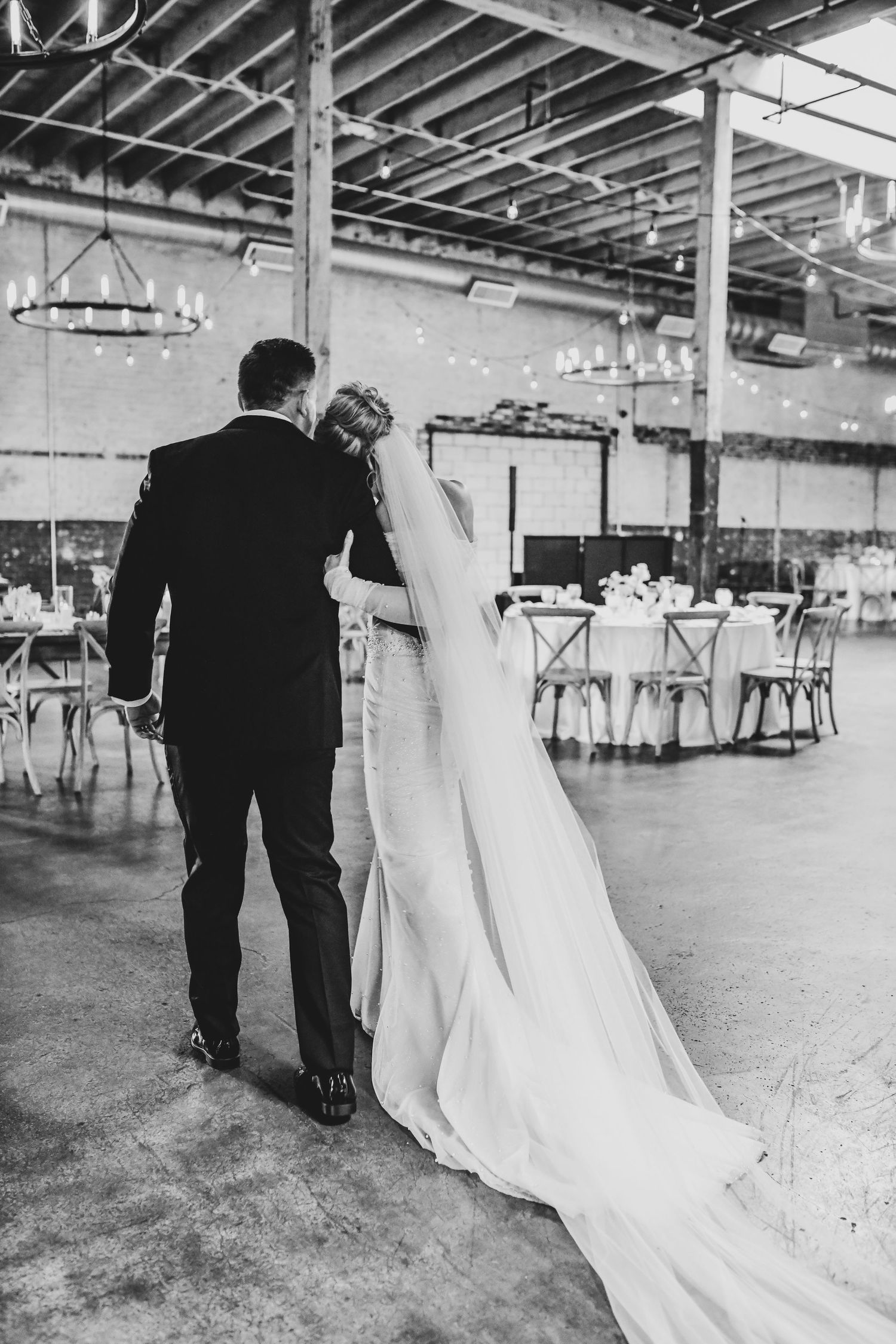 Editorial bride and groom portrait with modern architecture