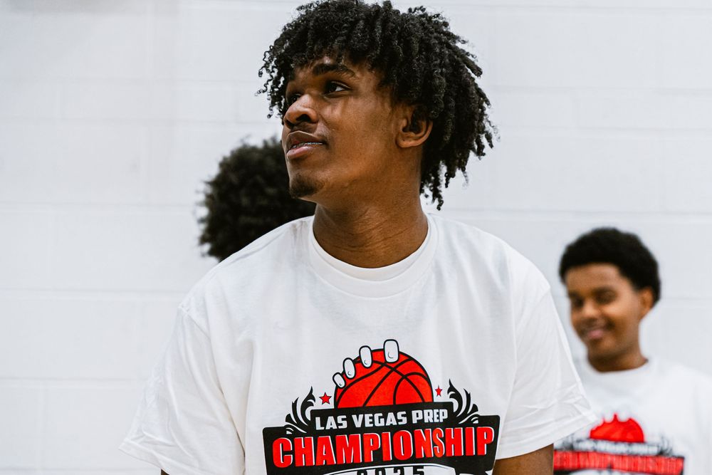 Mens Basketball Player looking off left frame