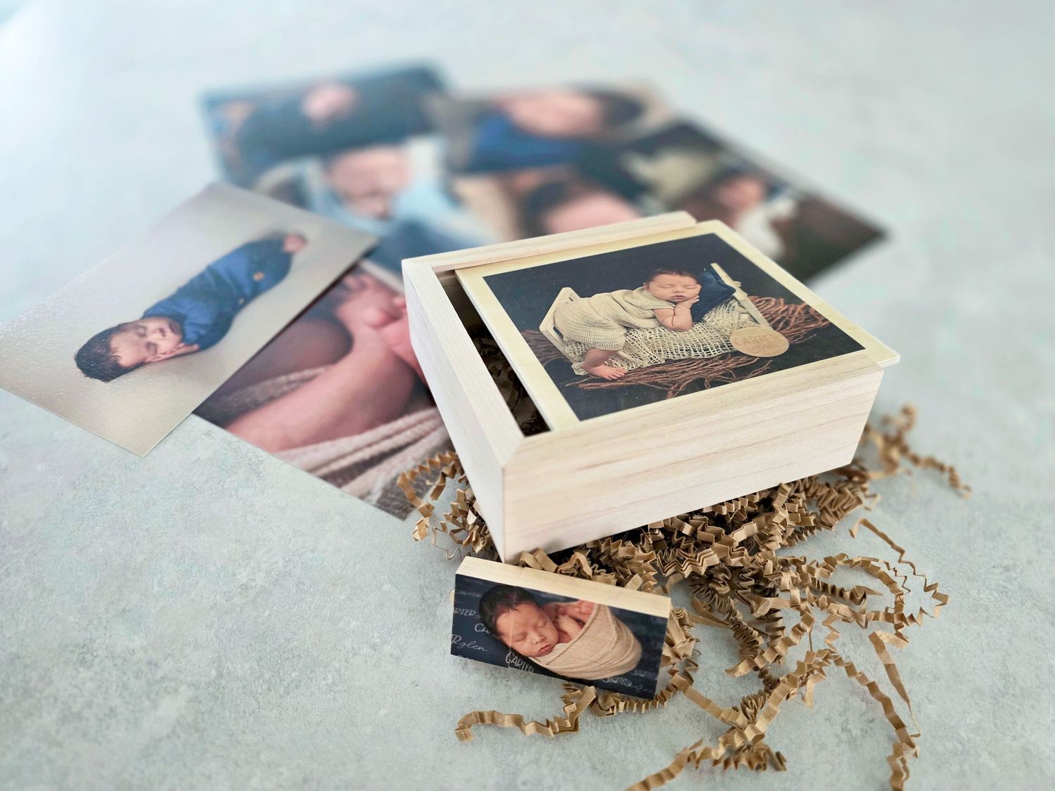 Newborn photos in wooden box
