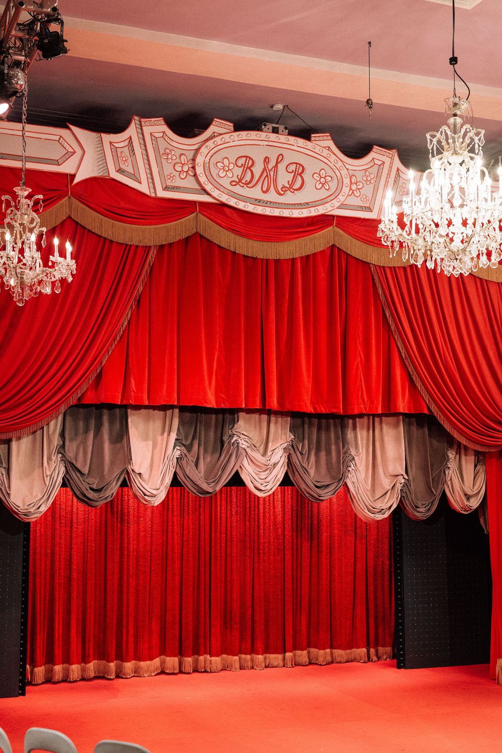 Red curtains for funky wedding ceremony in Los Angeles