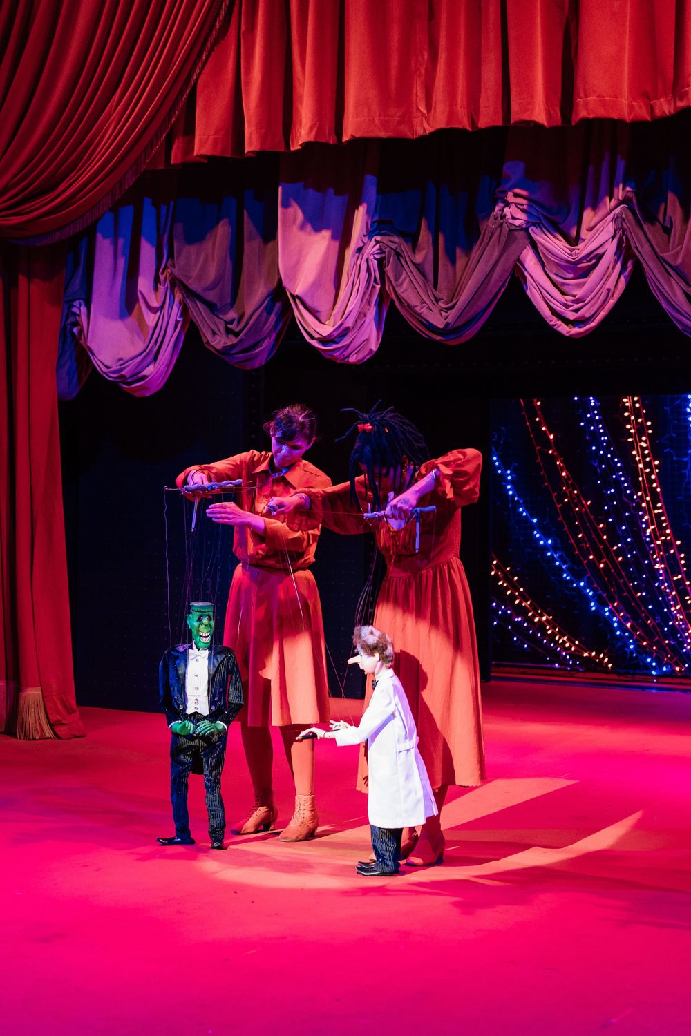 Puppets dance on stage at Bob Baker Marionette Theater for a wedding ceremony