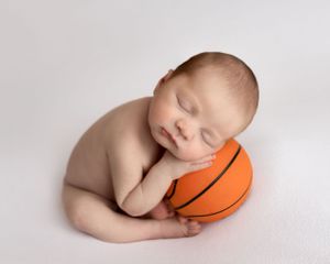 Newborn baby photographer east cork photography baby with ball