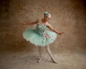 Elegant portrait of mature balletdancer in studio