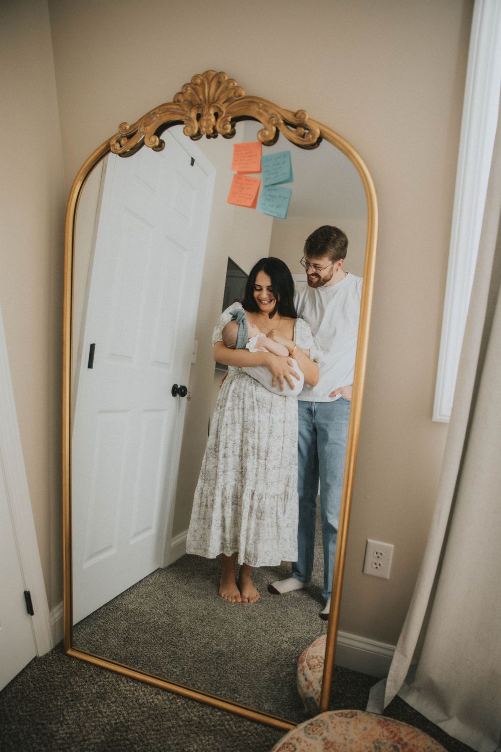 A series of mirror reflections showing a couple in casual attire standing together in a bedroom.