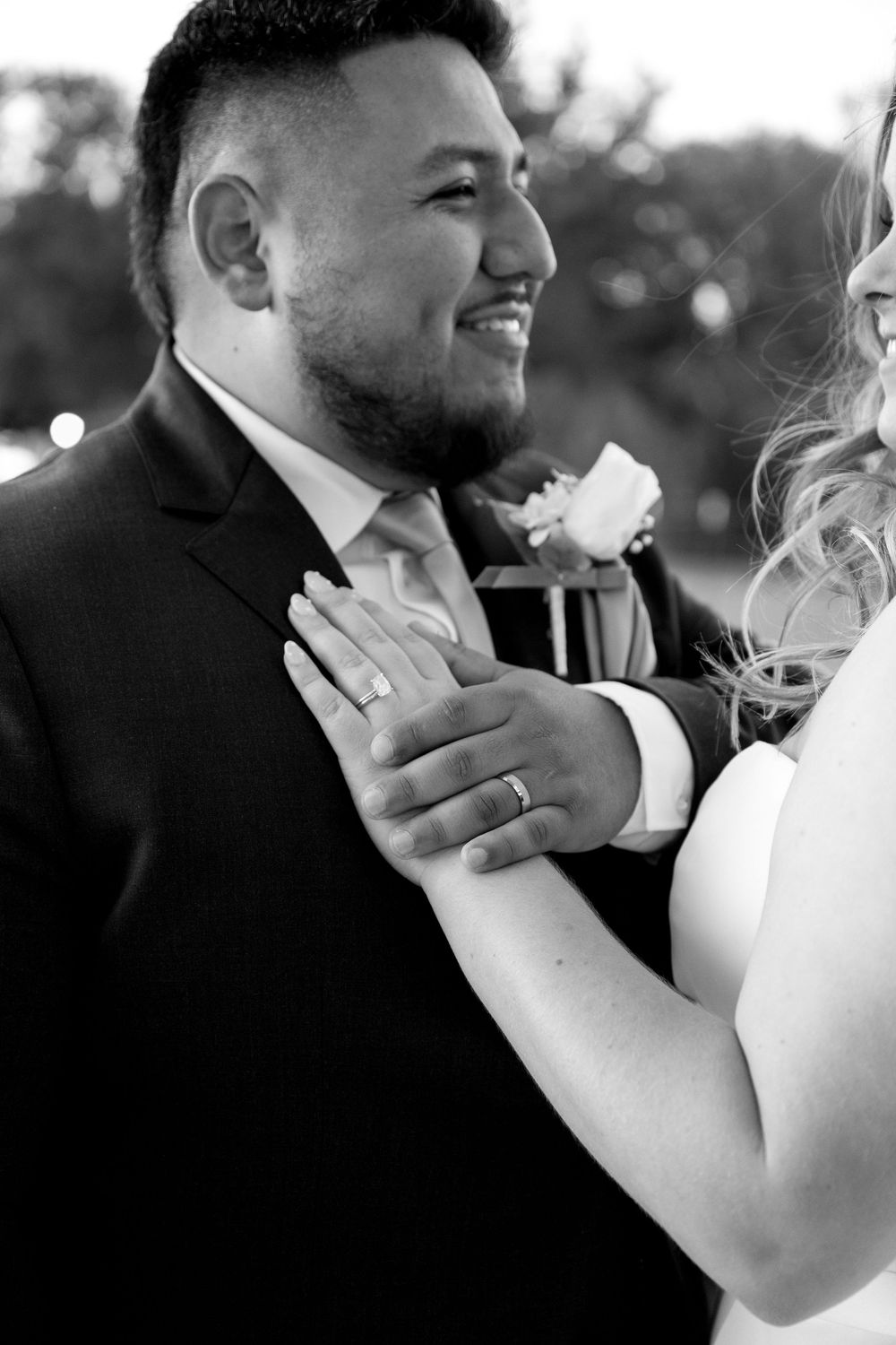 Black and white series of tender moments between newlyweds showing gentle touches and emotions.