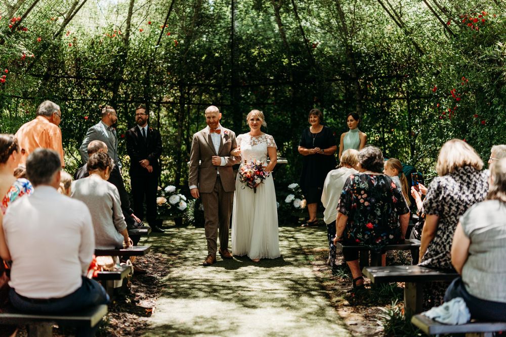 bride-and-groom-leaving-the-tree-church