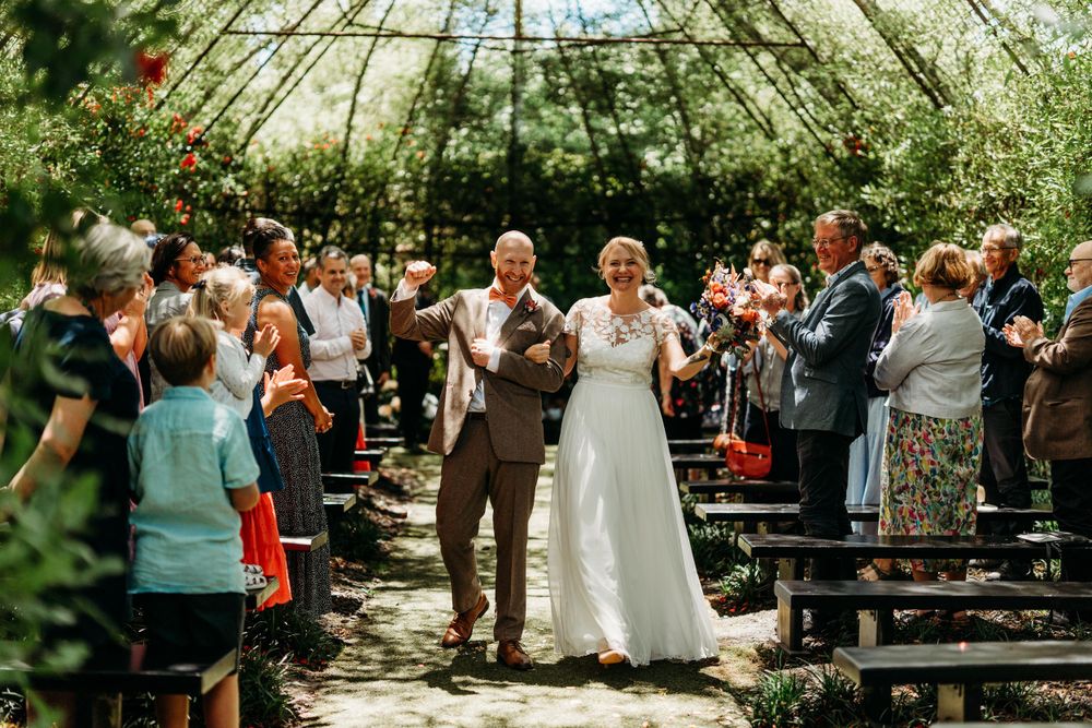 bride-and-groom-leaving-the-tree-church