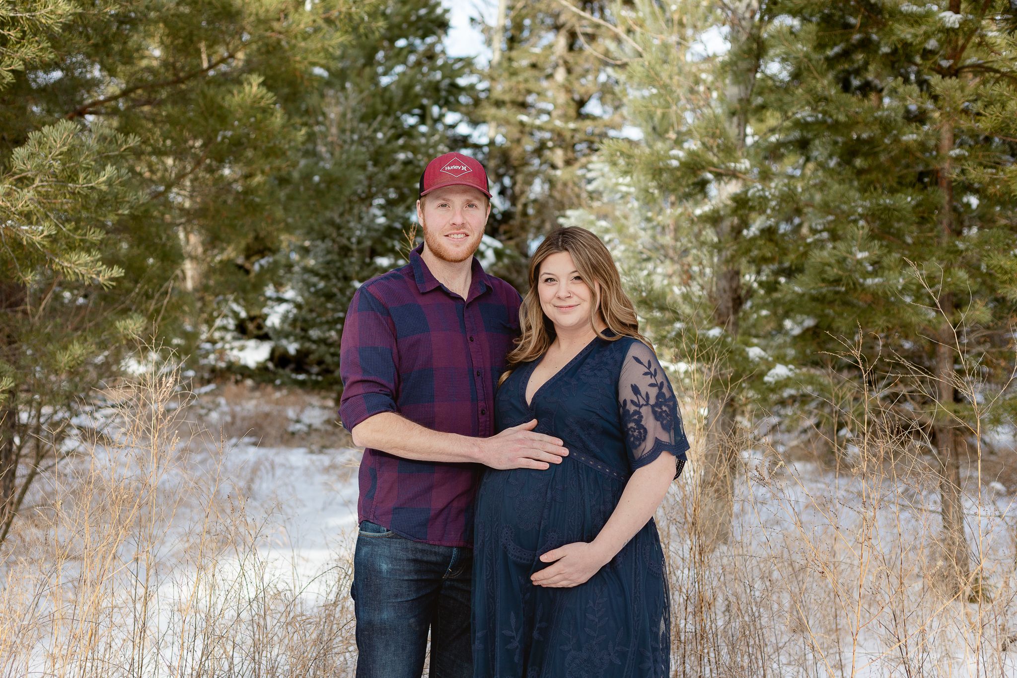 winter maternity. husband and wife