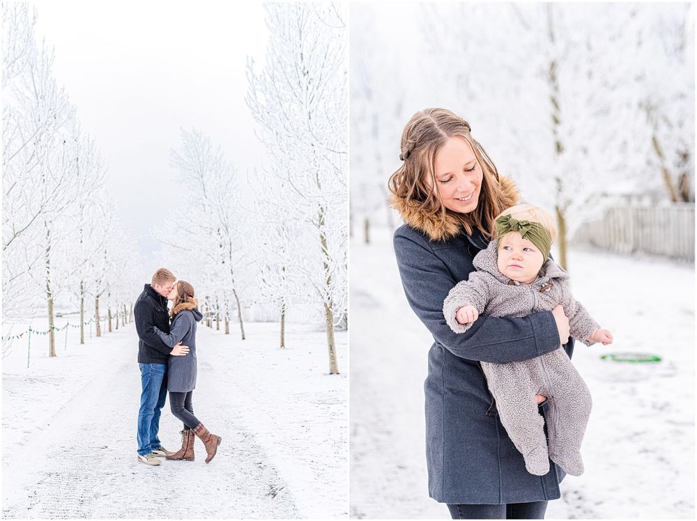 Winter family photoshoot in a snow-covered landscape with frost-covered trees.
