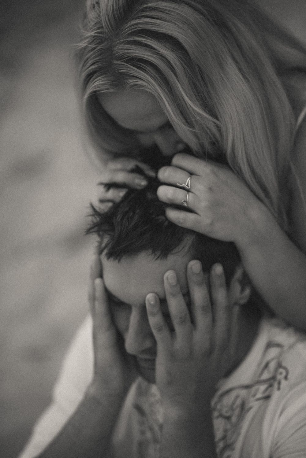 Series of black and white close-up shots showing emotional expressions.