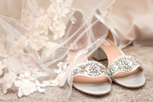 A detail photo of a veil and the bride's shoes on her wedding day. Photo taken in Langley, BC by Kari Mills Photography.
