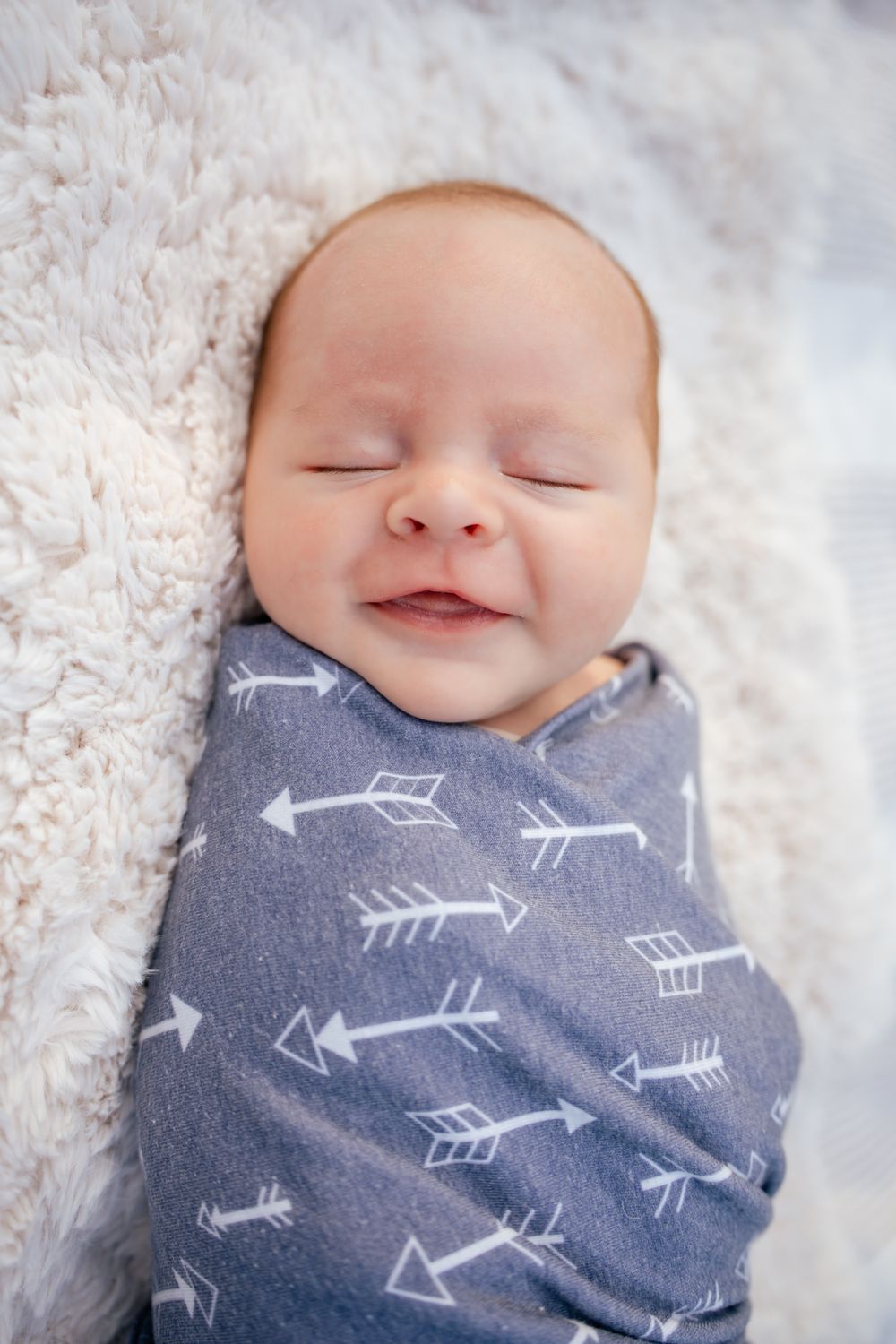 baby boy smiles