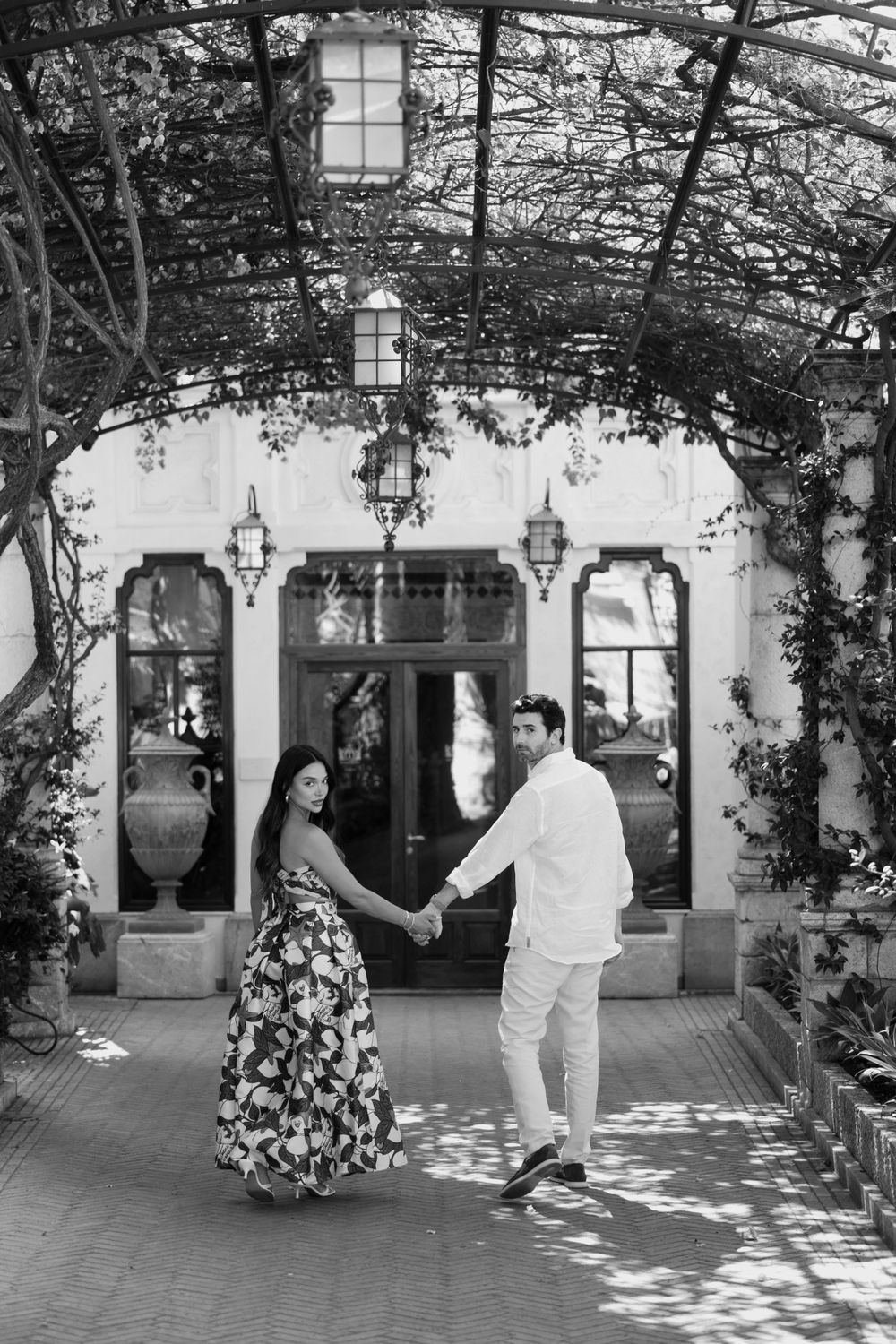 Couple holding hands during an engagement shoot in Taormina, Sicily
